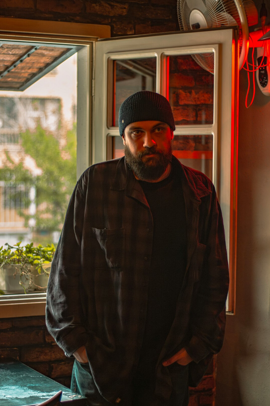 Portrait of a bearded man in a casual shirt
